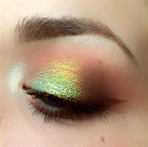 iridescent green eyeshadow.